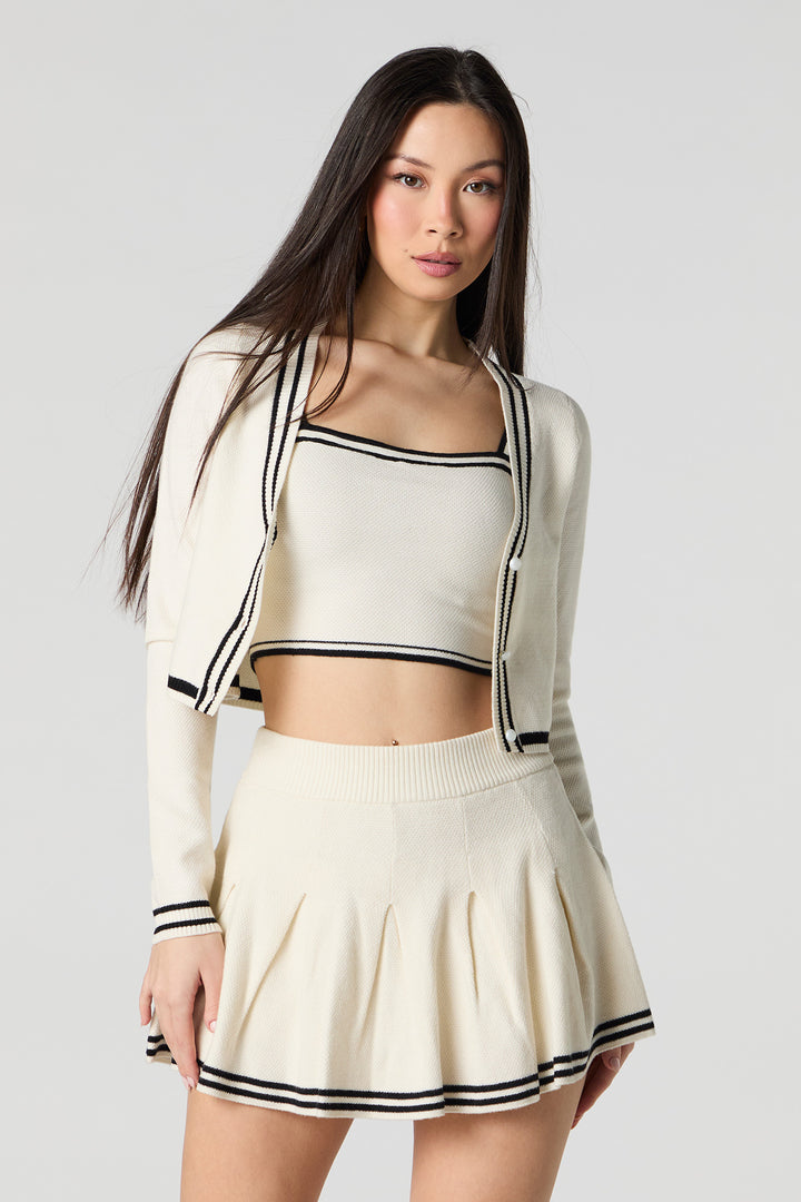 Jupe-short de tennis plissée avec liséré en tricot rayé