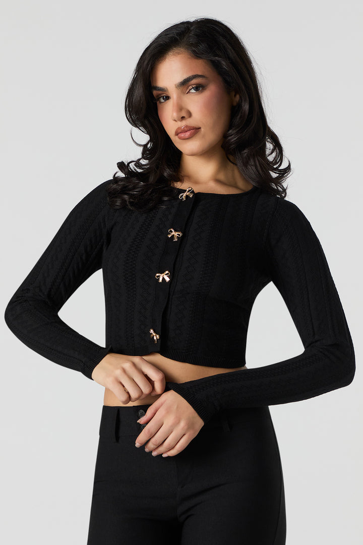 Chandail boutonné en tricot de pointelle avec boucle