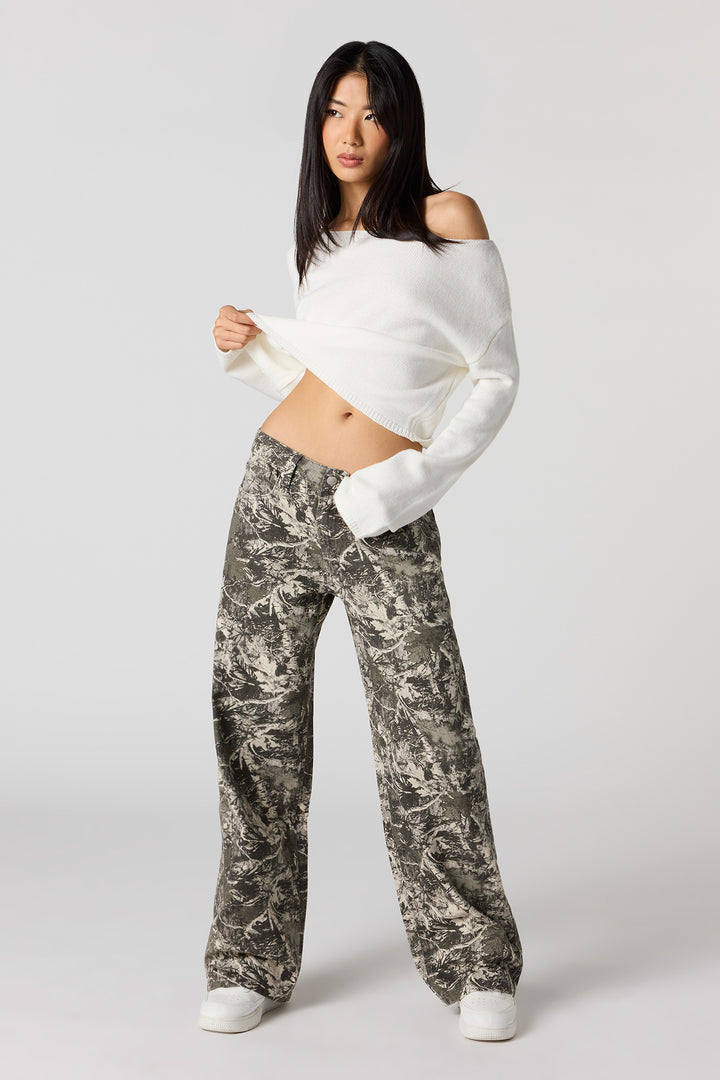 Pantalon baggy à taille basse avec motif camouflage et boucles