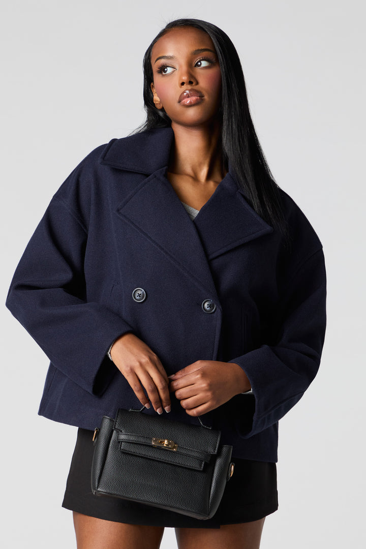 Manteau court à double boutonnage