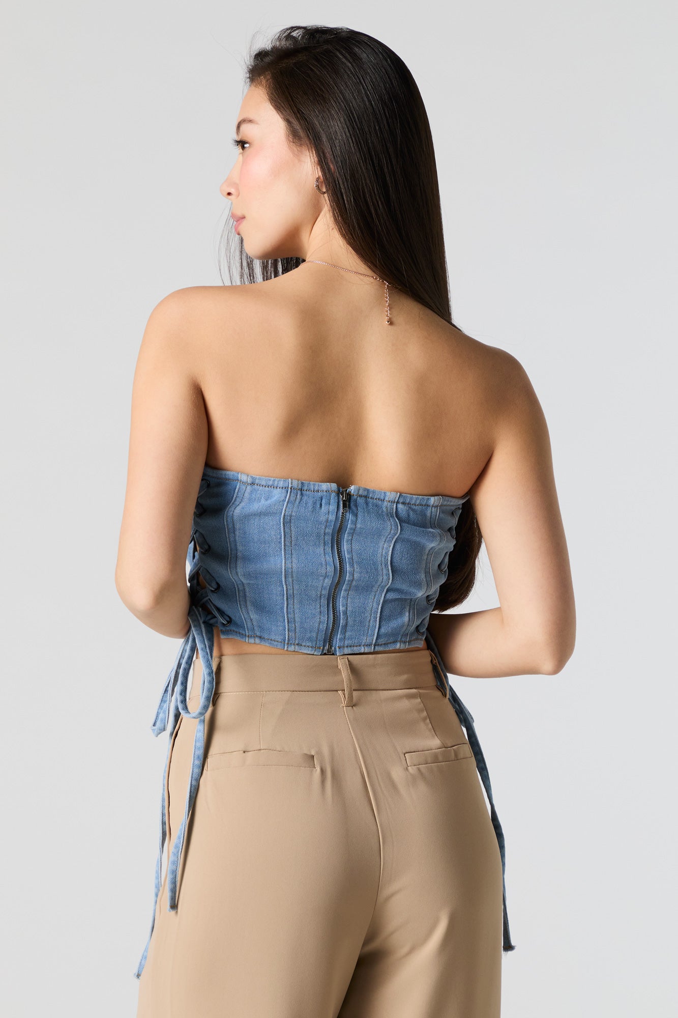 Haut corset sans bretelles lacé en denim