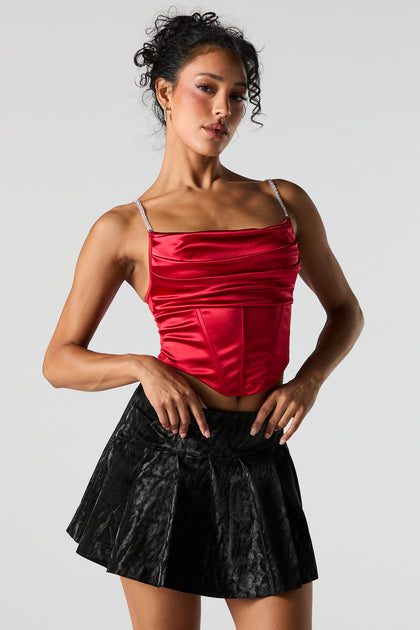 Haut corset en satin avec bretelles ornées de pierres du Rhin