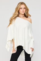 Poncho à col bateau en tricot