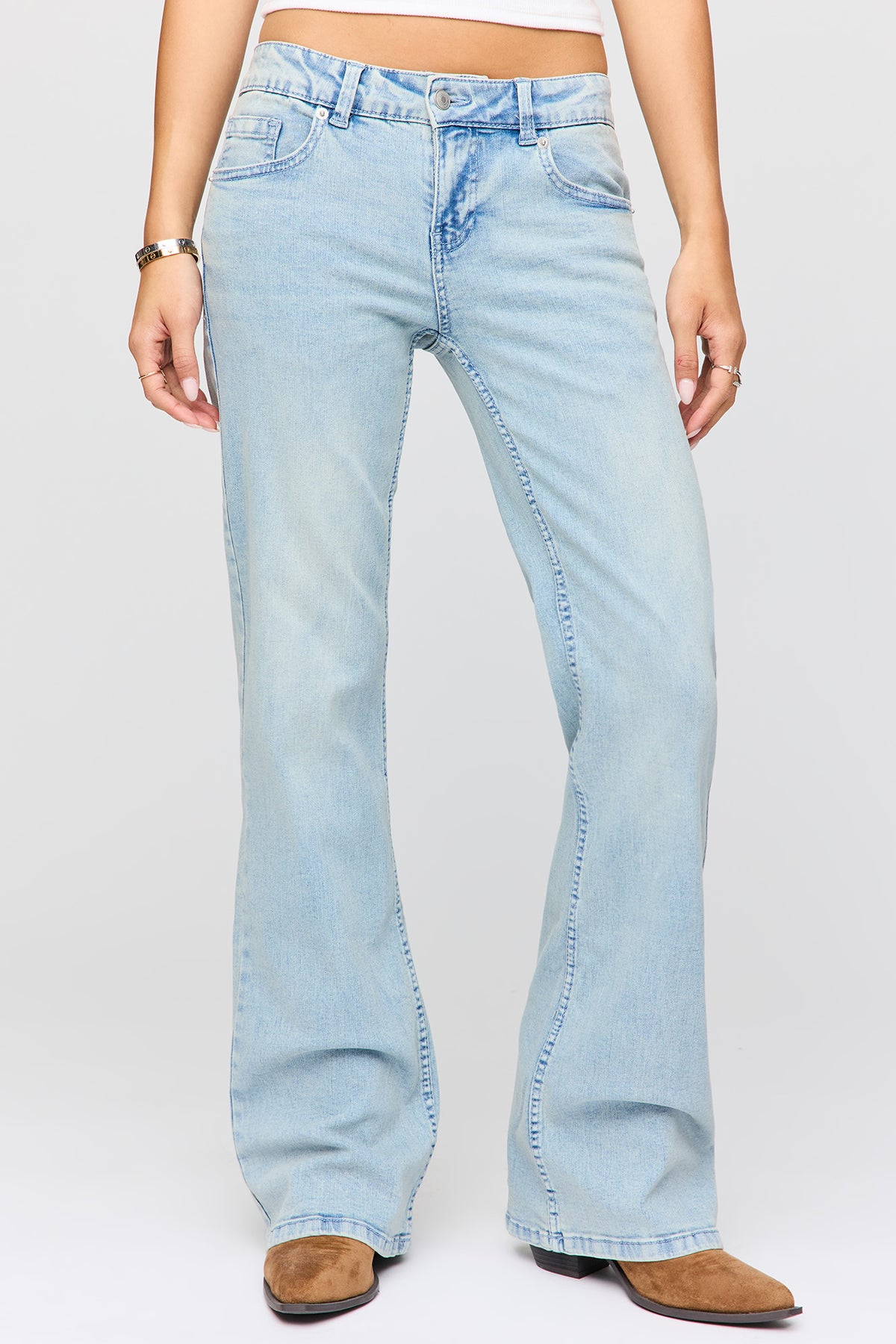 Alt View 2. Stretch Super Low Rise Flare Jean - Light Denim Blue