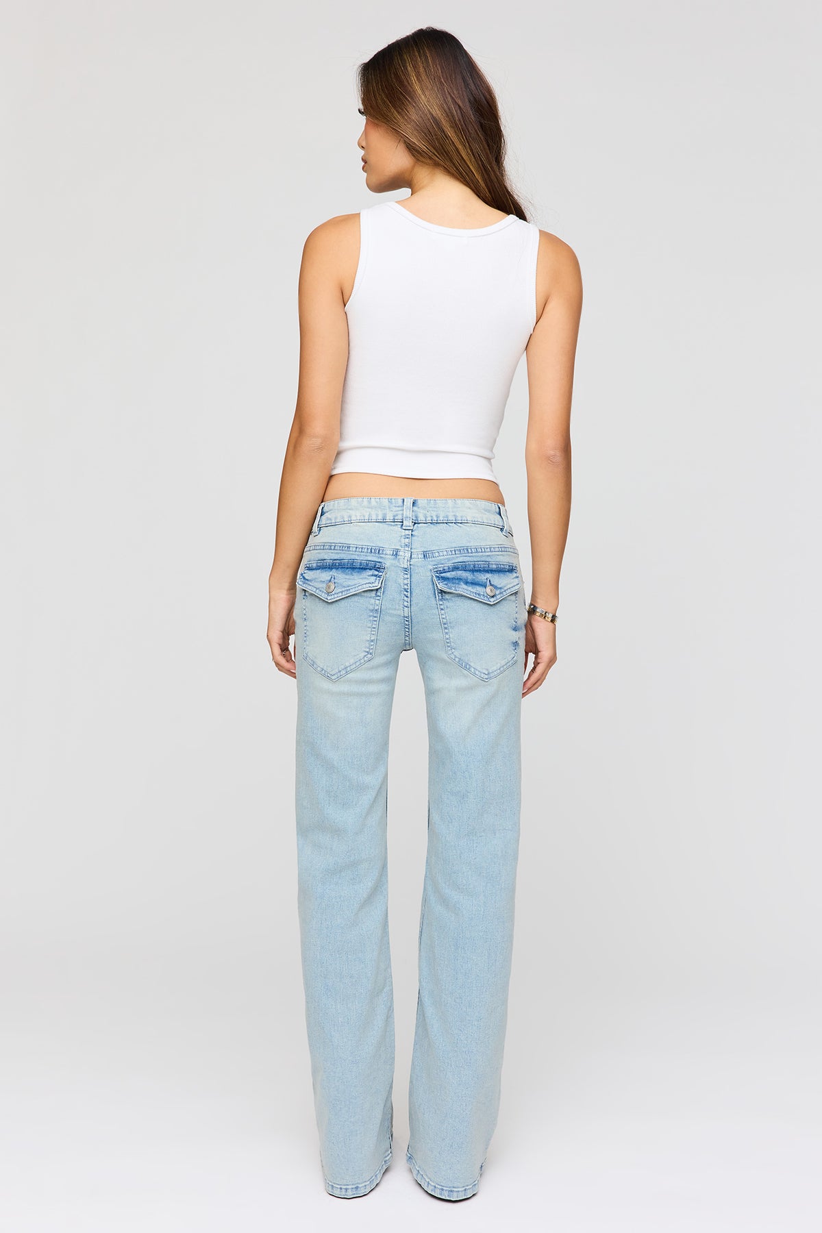 Alt View 3. Stretch Super Low Rise Flare Jean - Light Denim Blue