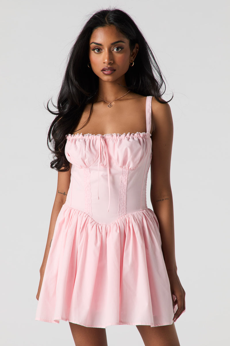 Minirobe corset avec liséré de dentelle