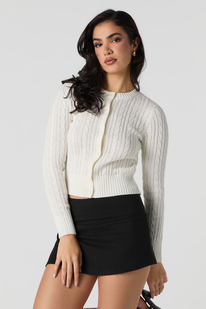 Cardigan en tricot mailles torsadées