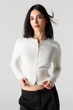 Haut à capuchon en tricot avec fermeture à glissière