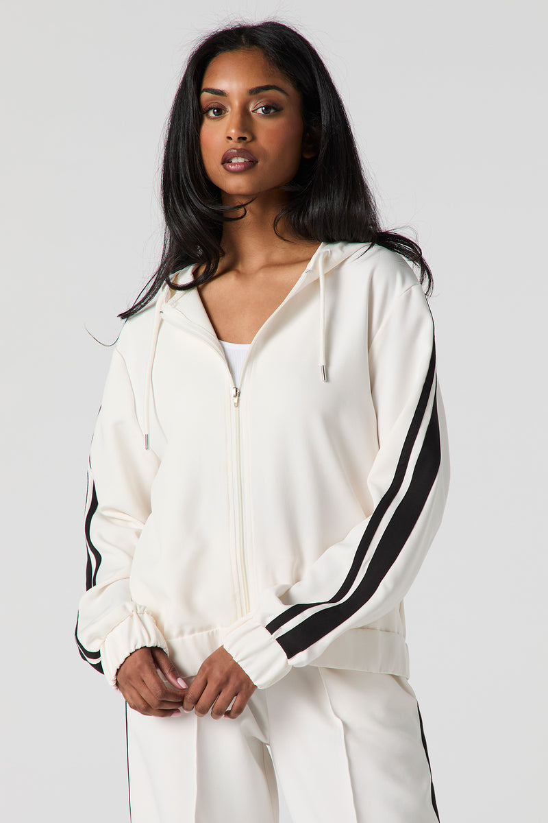 Haut à capuchon Active avec rayures contrastantes et fermeture à glissière