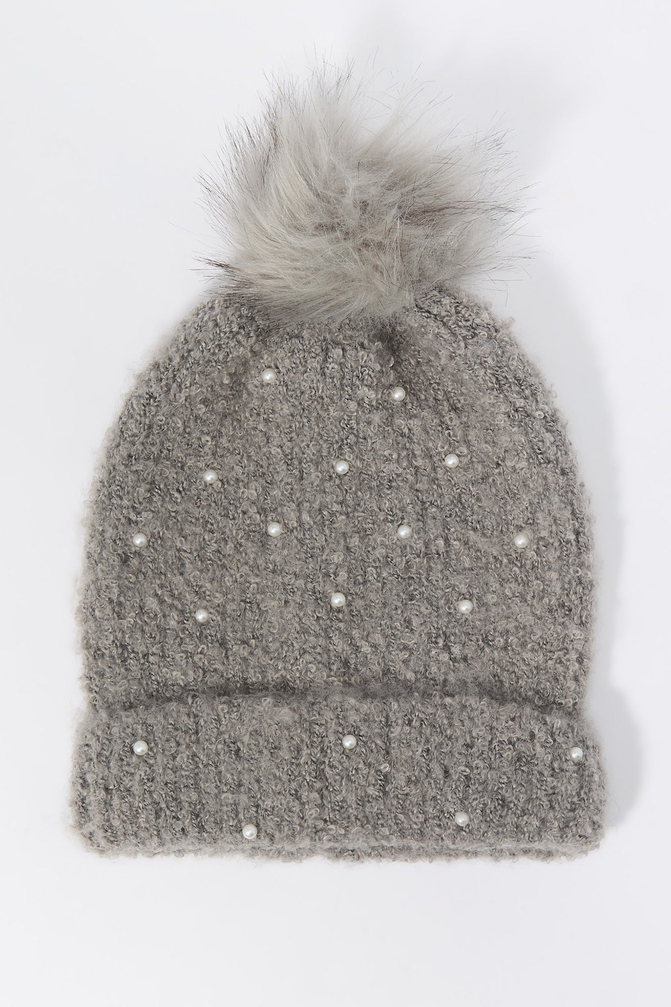 Tuque en tricot avec perles et ponpom