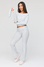 Ensemble avec haut rayé à manches longues, pantalon et bandeau