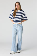 Jean à jambe évasée et taille basse