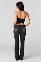 Stretch Low Rise Embroidered Pocket Flare Jean