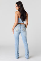 Stretch Low Rise Embroidered Pocket Flare Jean