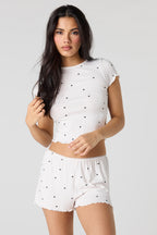Ensemble pyjama avec t-shirt en pointelle avec liséré volanté et short