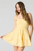 Minirobe smockée avec oeillets
