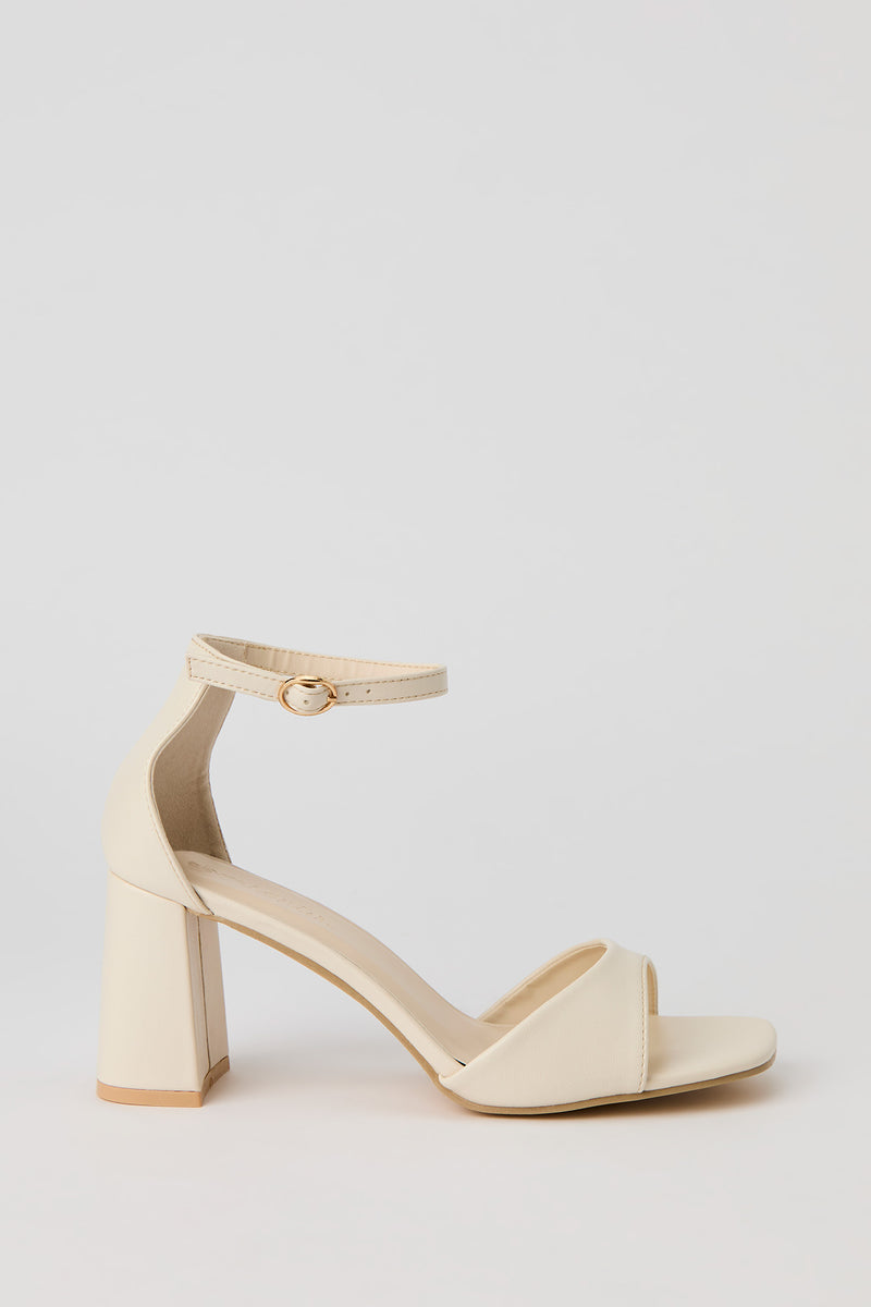 Escarpins avec bride en similicuir