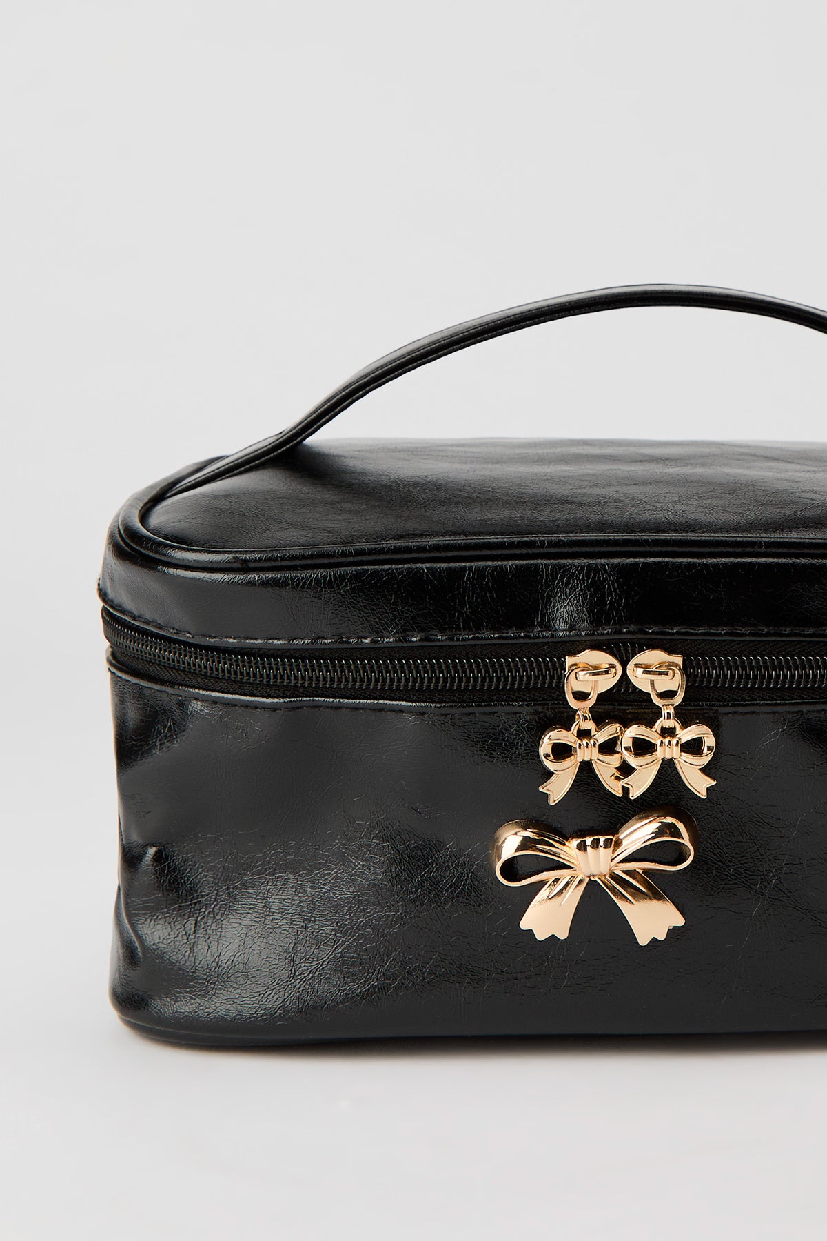 Vue alternative 3. Trousse à maquillage avec boucle
