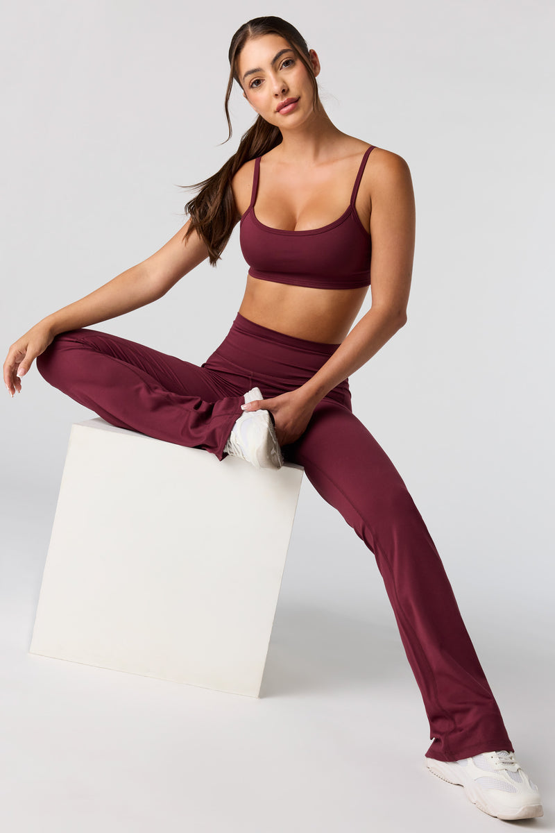 Pantalon à jambe évasée Active avec poches arrière