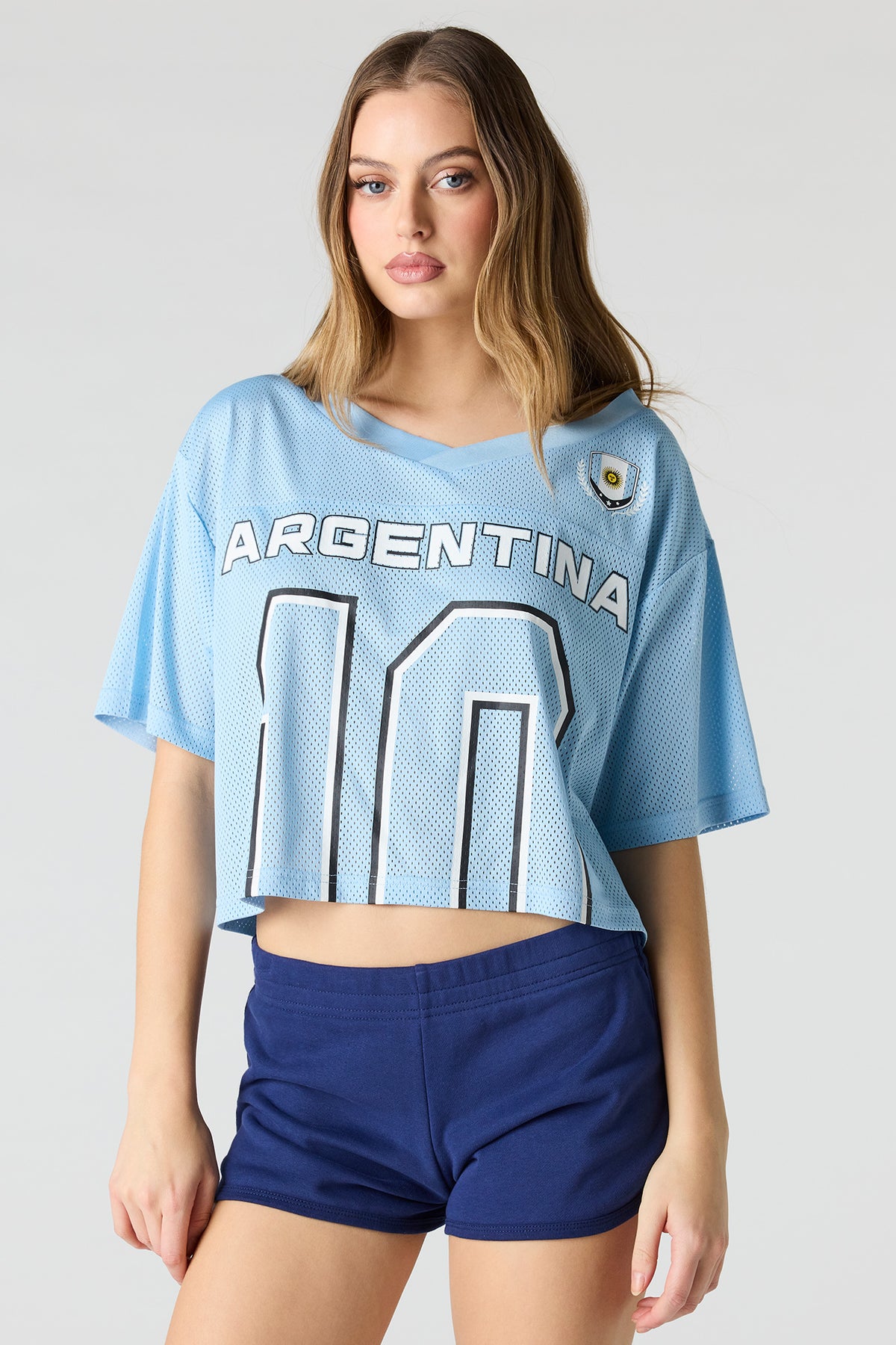 Vue alternative 2. Jersey de soccer à imprimé Argentina écourté en filet écourté