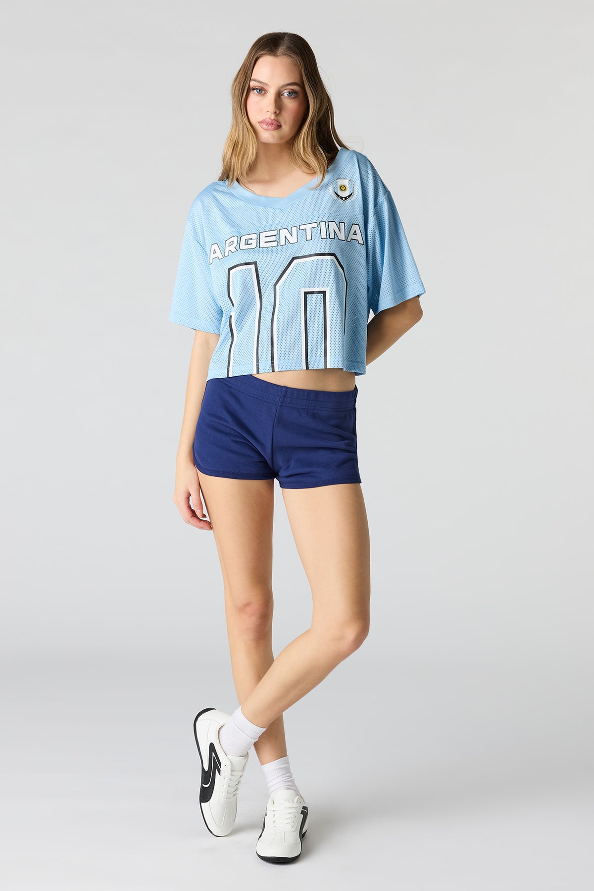 Vue alternative 4. Jersey de soccer à imprimé Argentina écourté en filet écourté