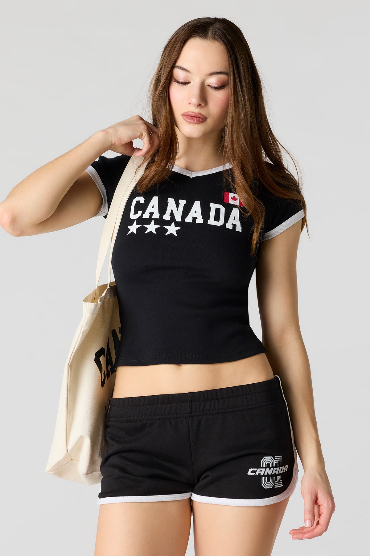 Alt View 2. Canada Graphic Fleece Dolphin Short - Black with White