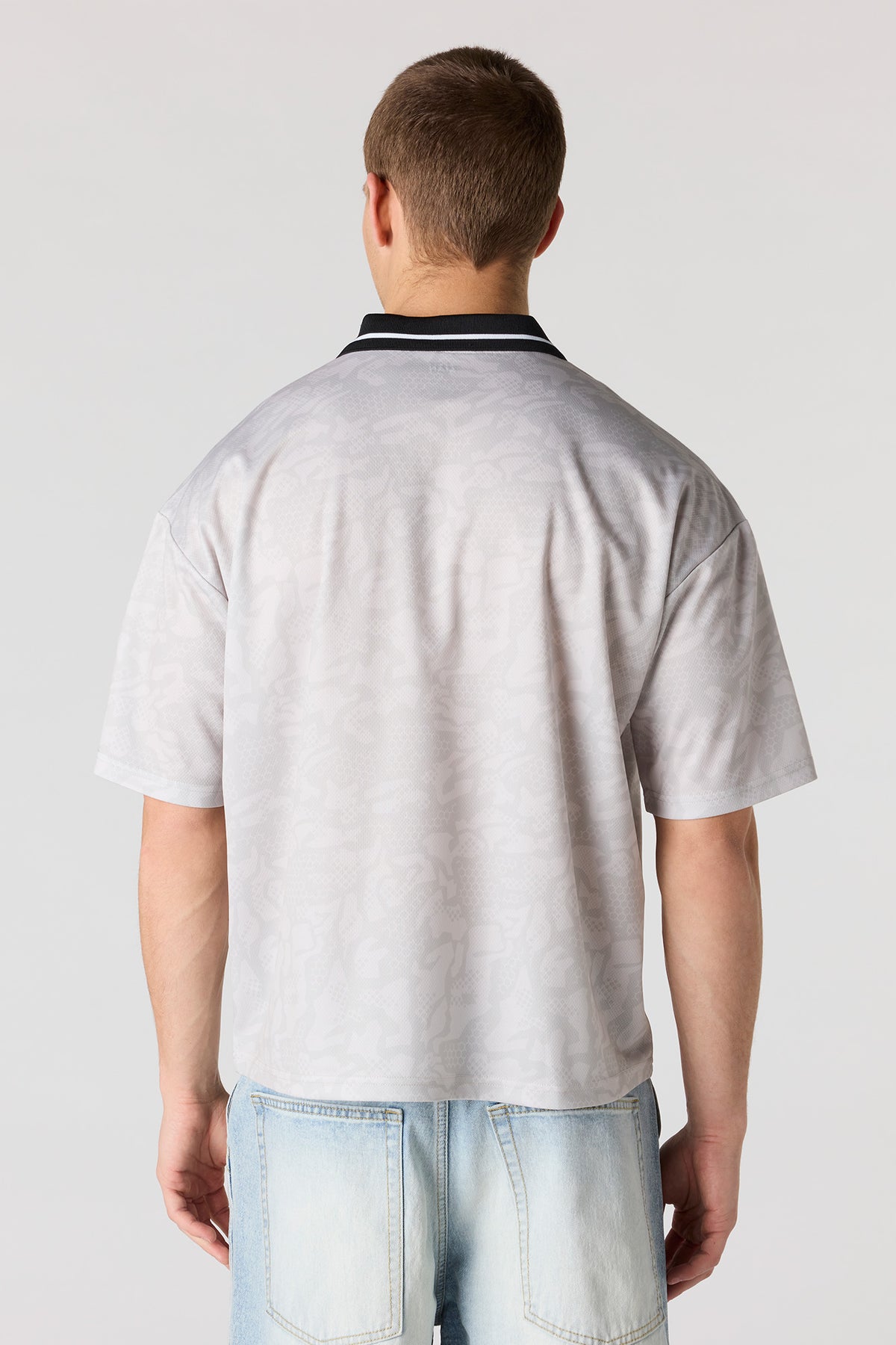Vue alternative 2. Polo de soccer en filet imprimé