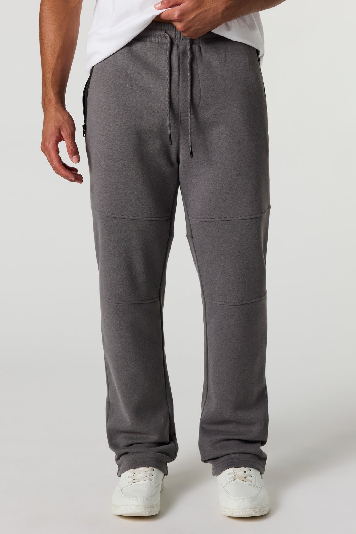 Pantalon d'entraînement en molleton avec poches à fermeture à glissière