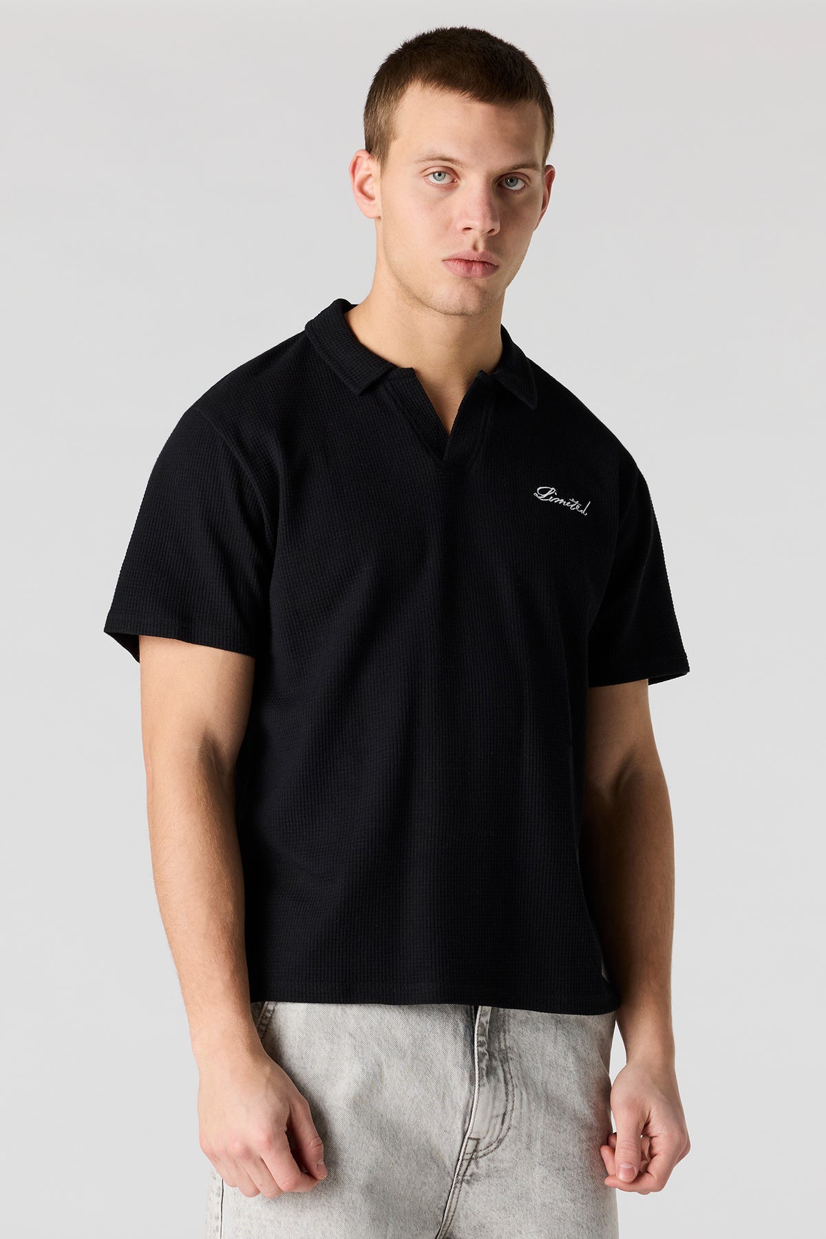 Polo en tricot gaufré brodé