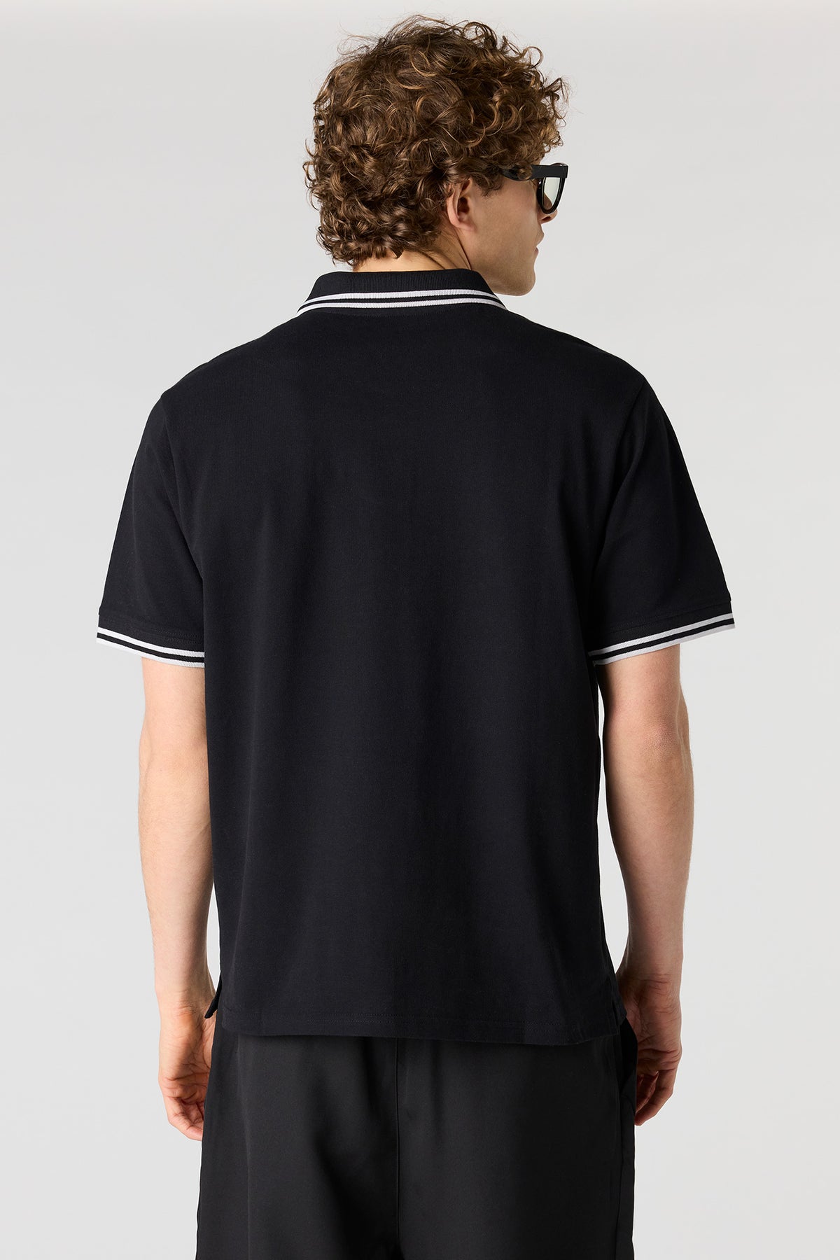Vue alternative 2. Polo à garniture rayée