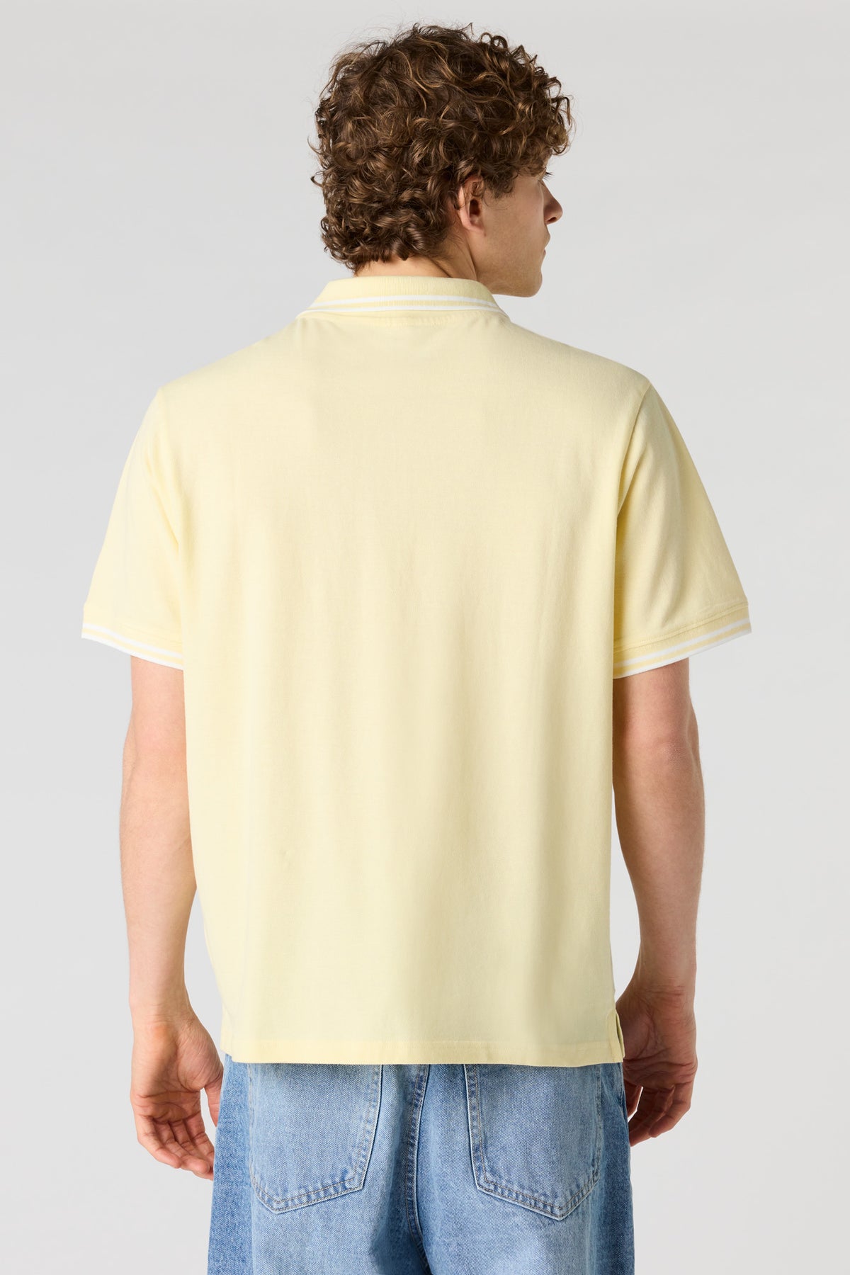 Vue alternative 2. Polo à garniture rayée