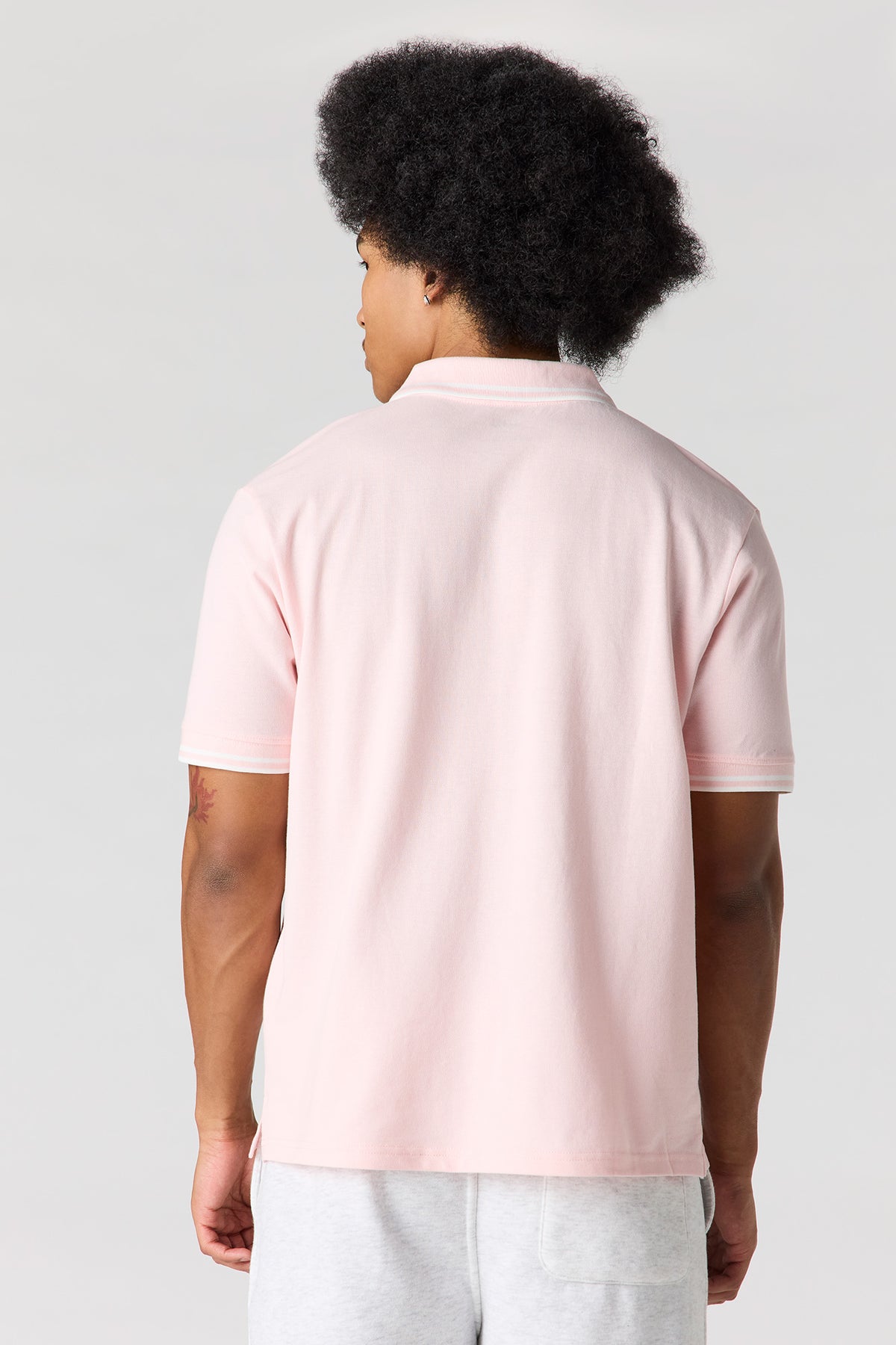 Vue alternative 2. Polo à garniture rayée