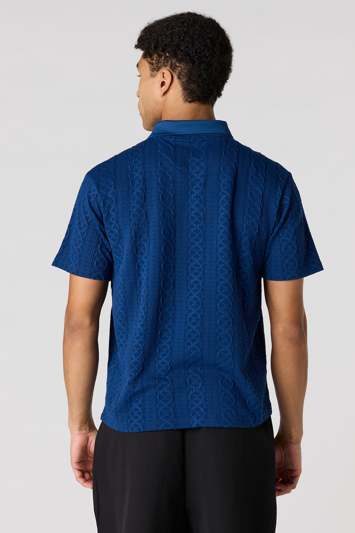 Vue alternative 2. Polo texturé avec fermeture à glissière