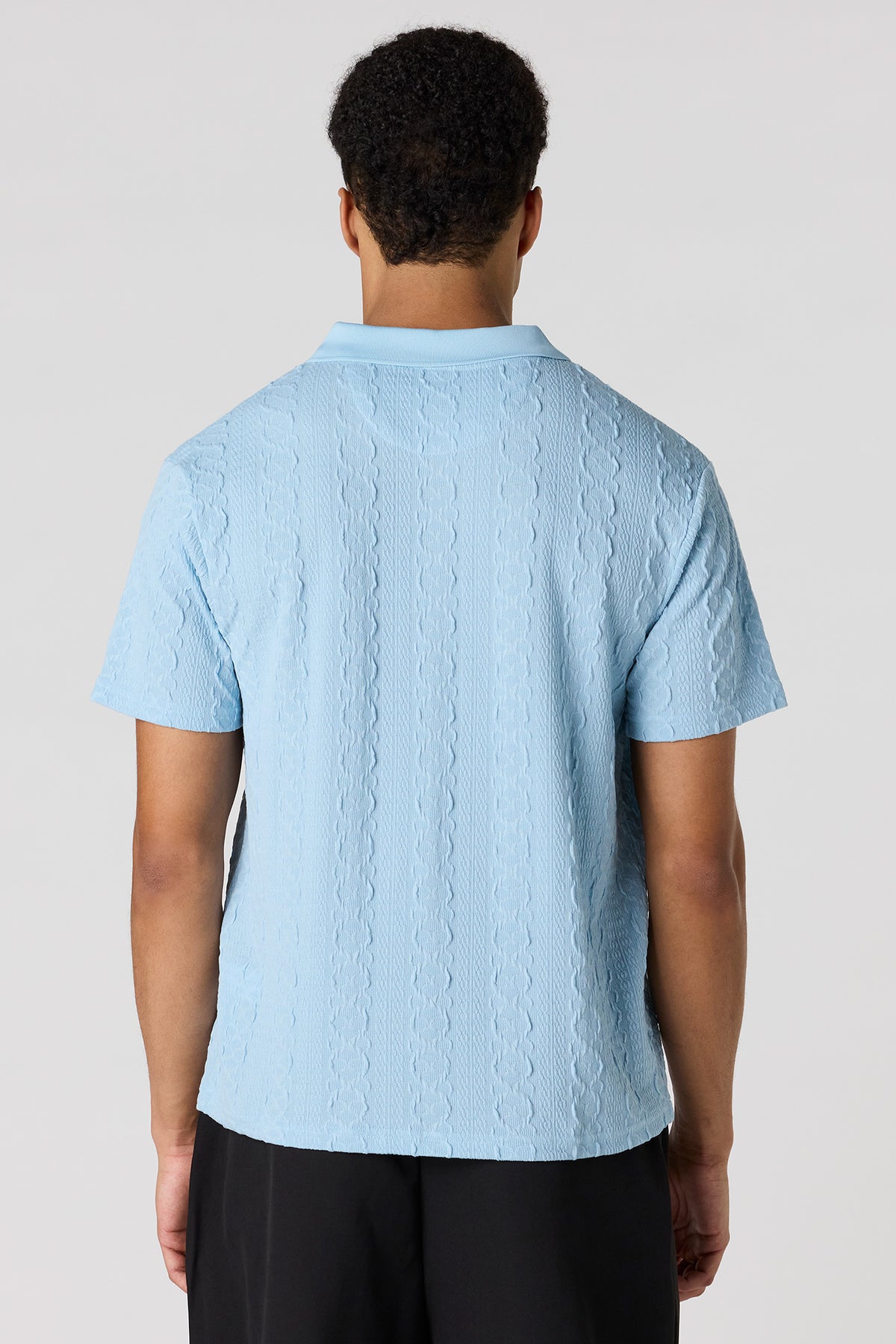Vue alternative 2. Polo texturé avec fermeture à glissière