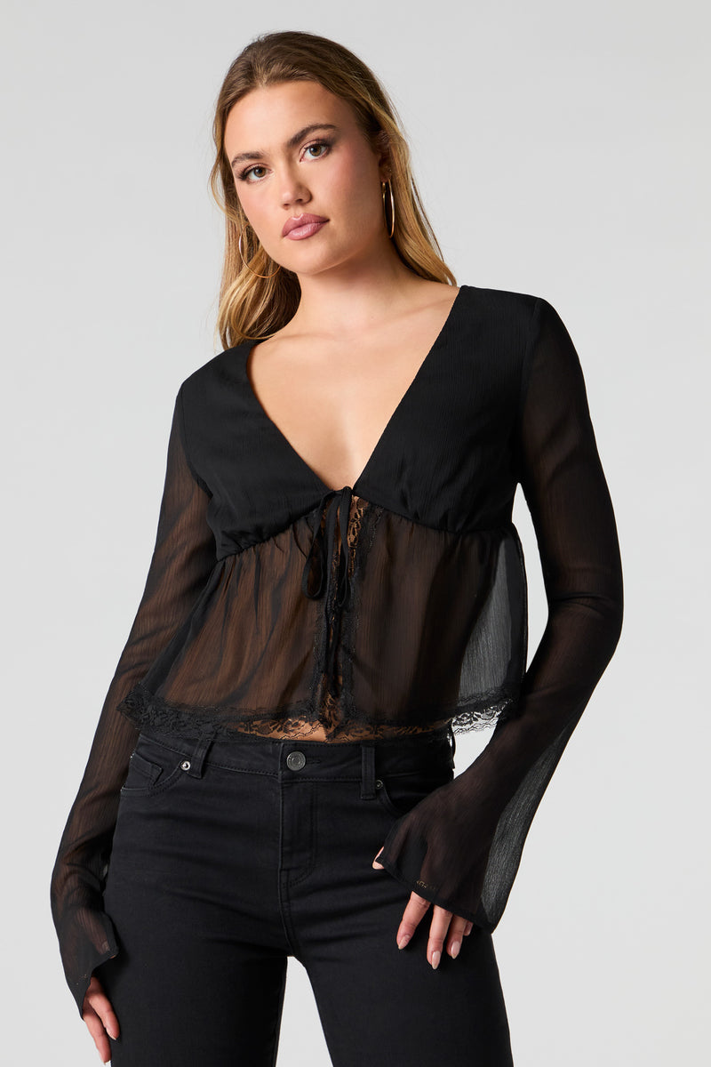 Haut ouvert en mousseline à manche longue avec attache