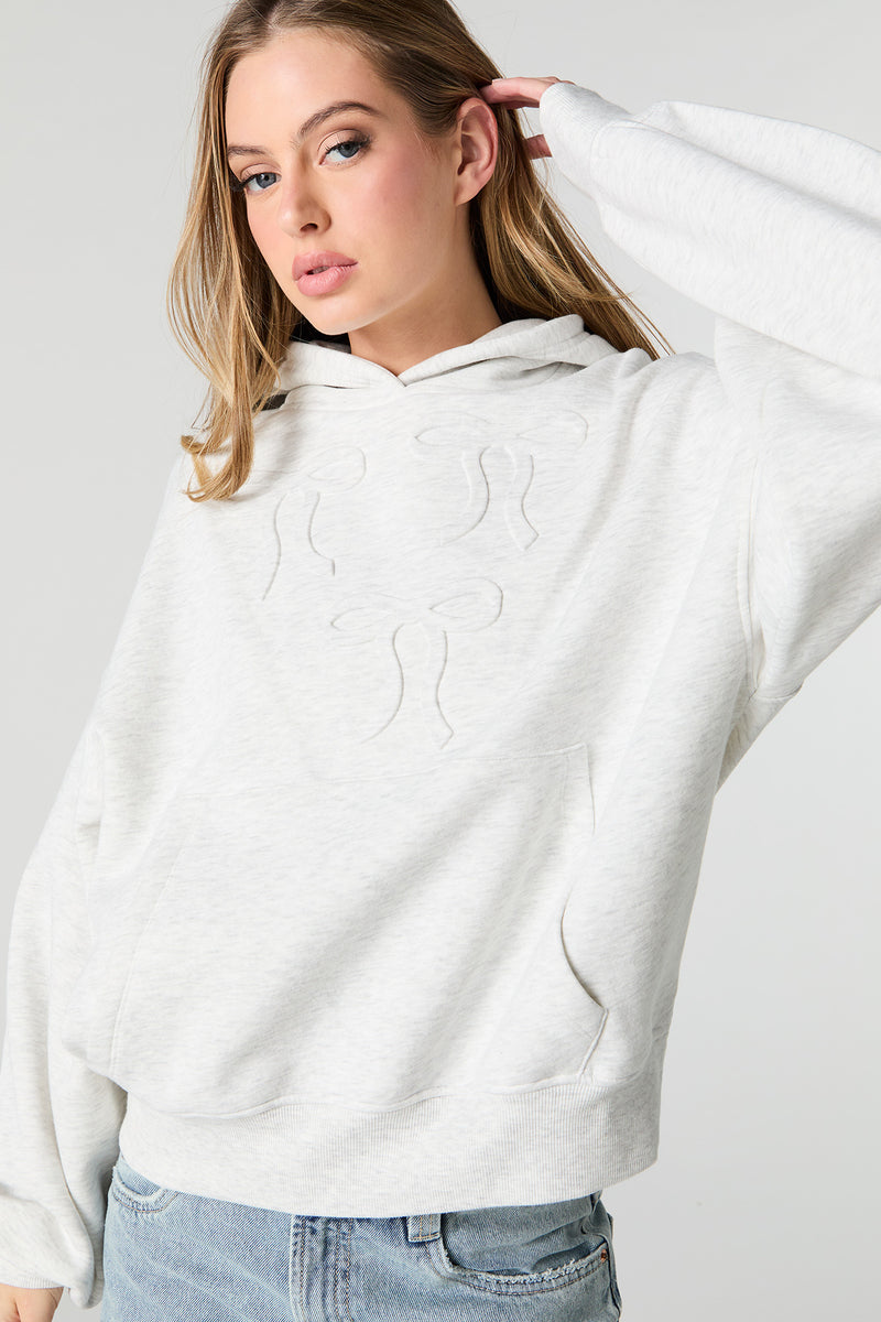 Haut à capuchon carré en molleton embossé