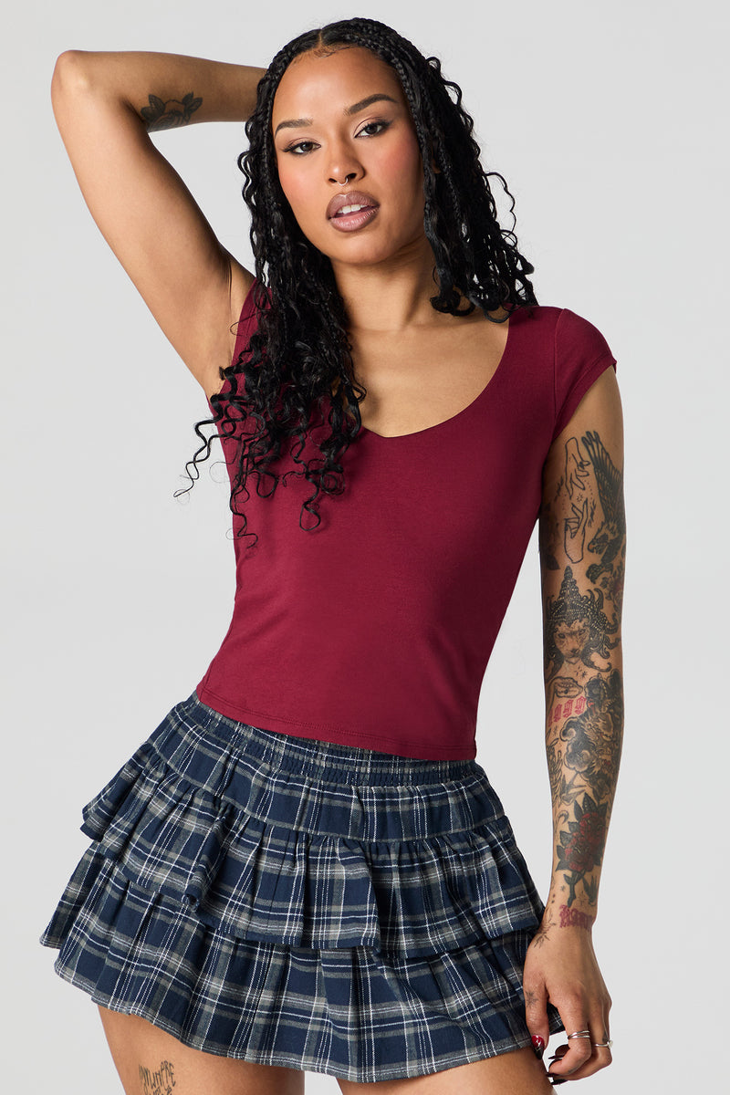 Haut profilé à mancherons avec encolure en V