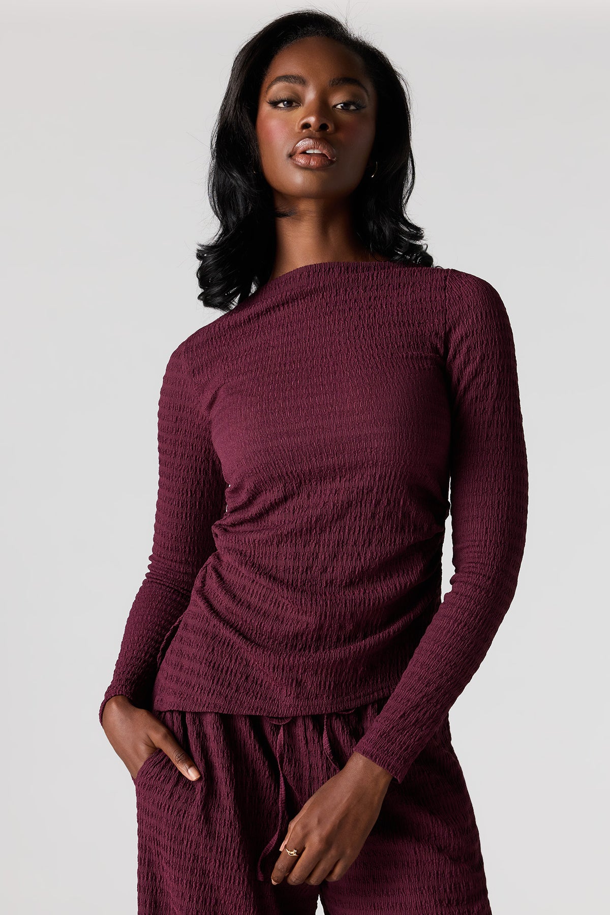 Haut asymétrique texturé à manches longues