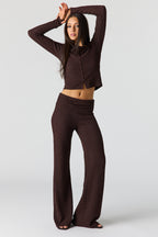 Pantalon à jambe évasée texturé avec bande repliée