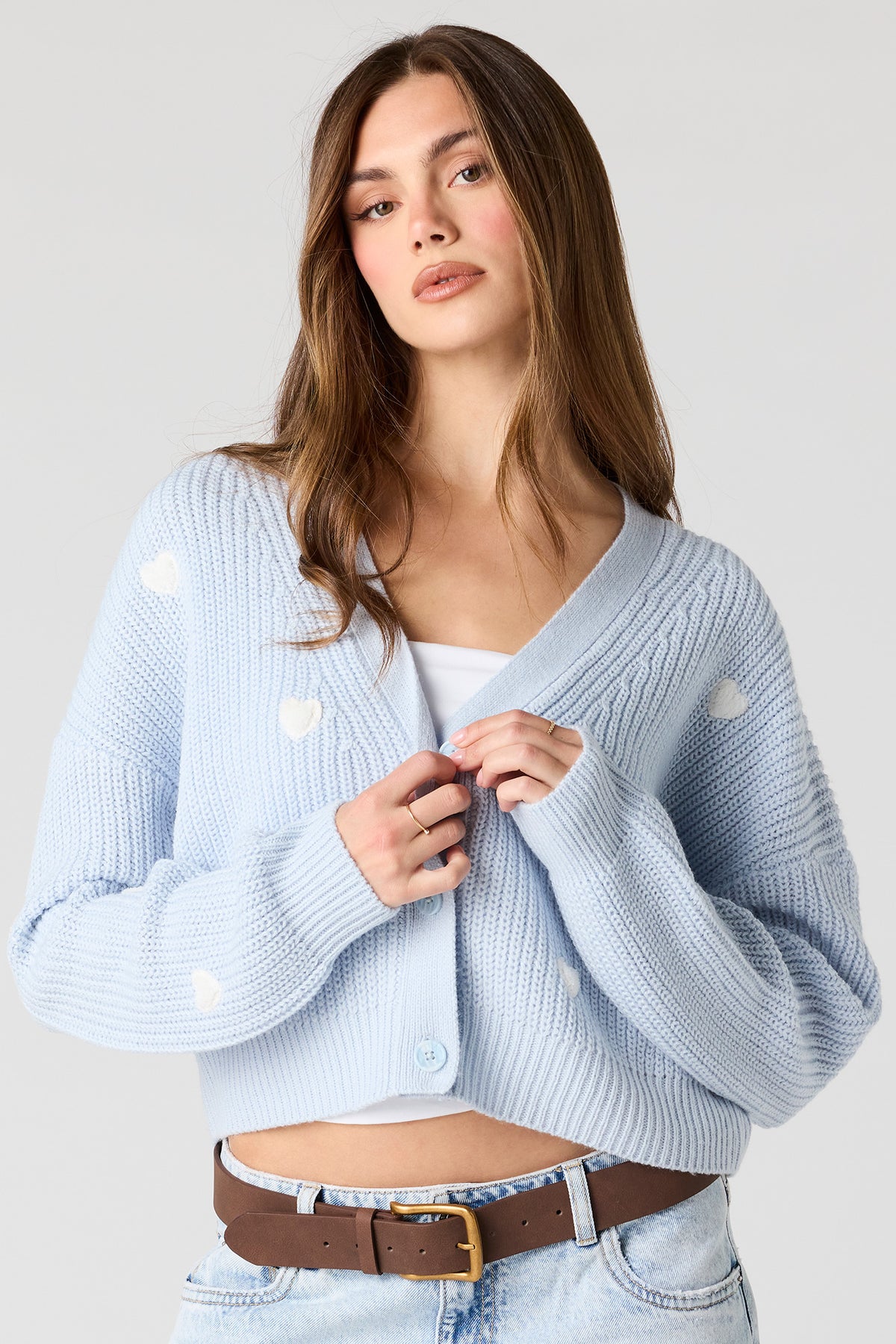 Cardigan boutonné avec coeur en 3D