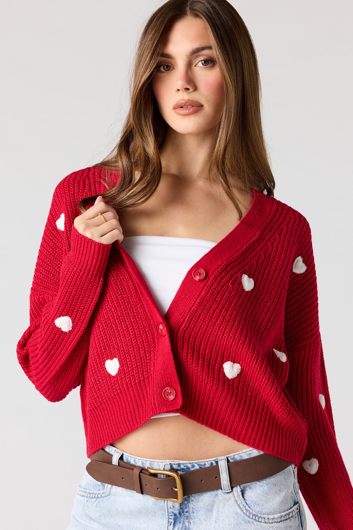 Cardigan boutonné avec coeur en 3D