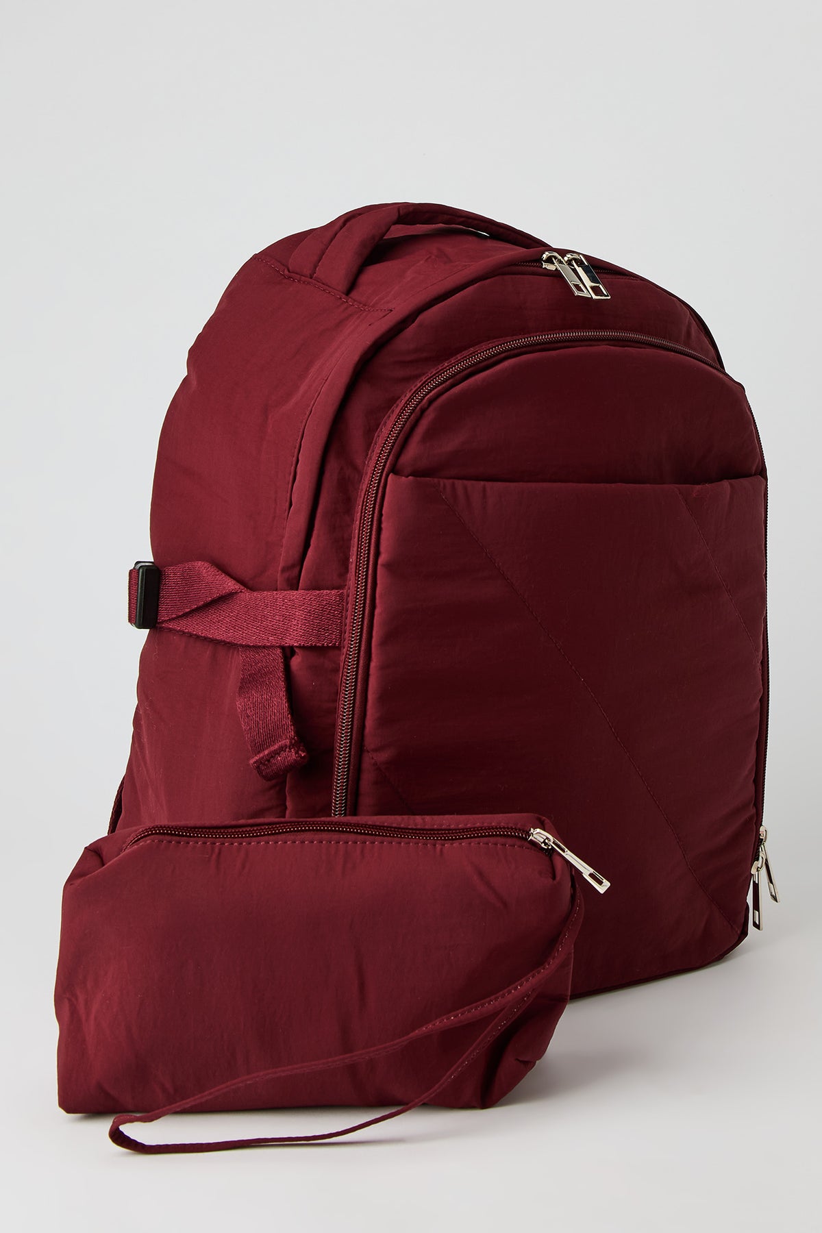 Sac à dos matelassé avec rangement à portable et étui à crayons