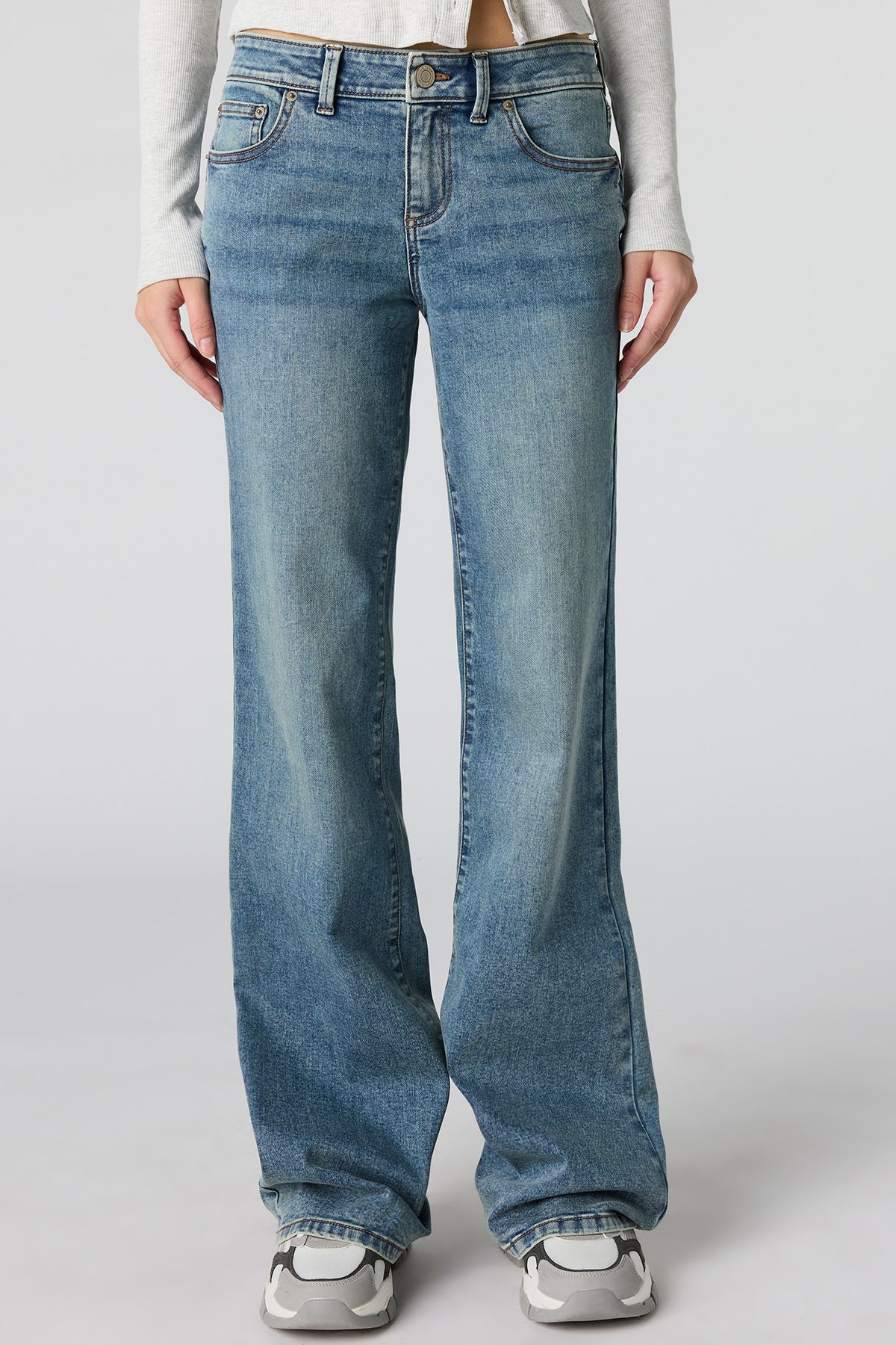 Alt View 2. Stretch Low Rise Relaxed Flare Medium Jean - Medium Blue