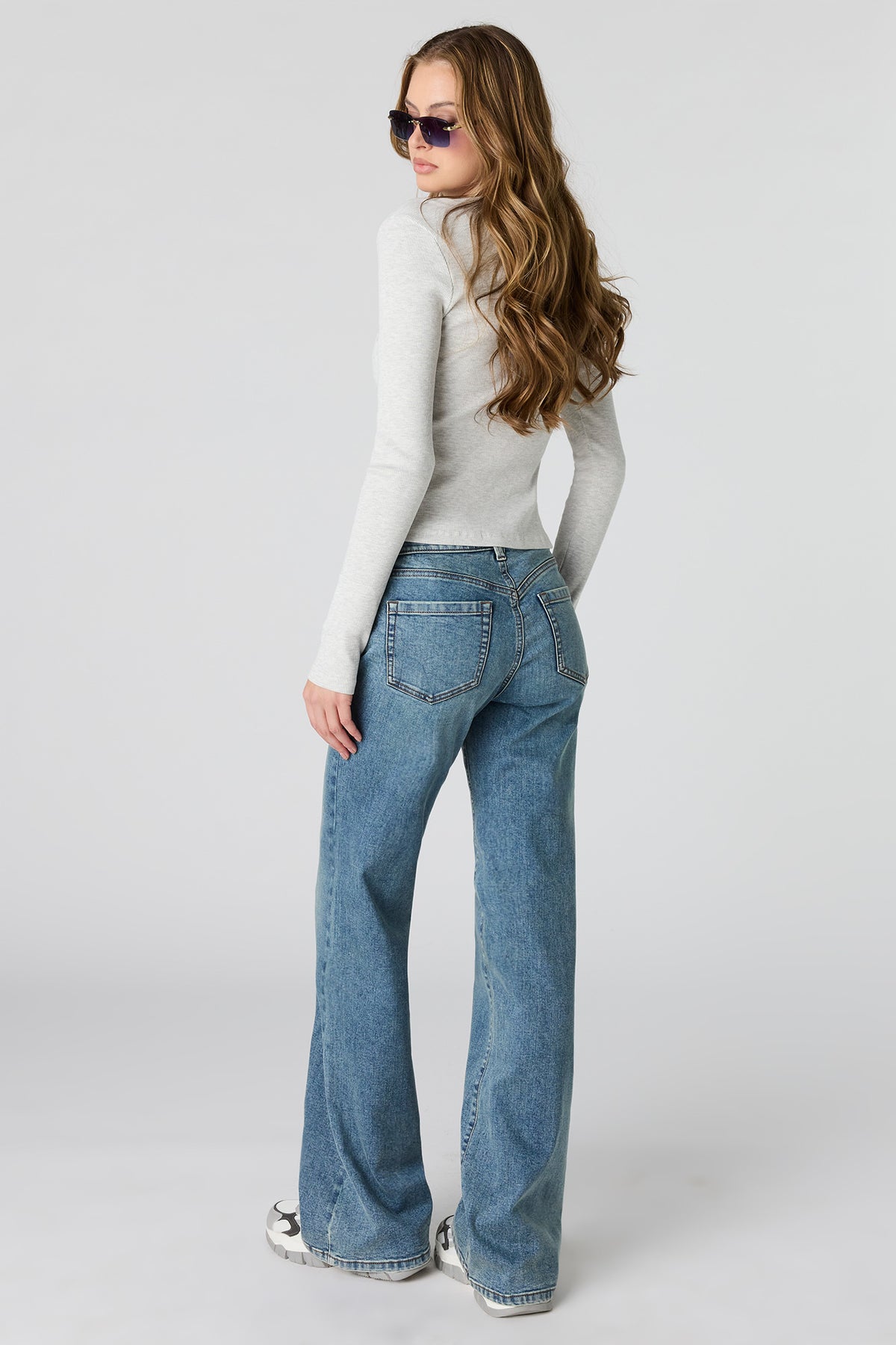 Alt View 3. Stretch Low Rise Relaxed Flare Medium Jean - Medium Blue