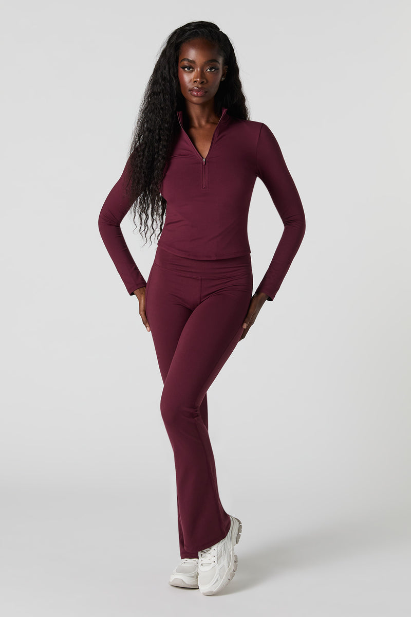 Haut à glissière un quart et manche longue Active