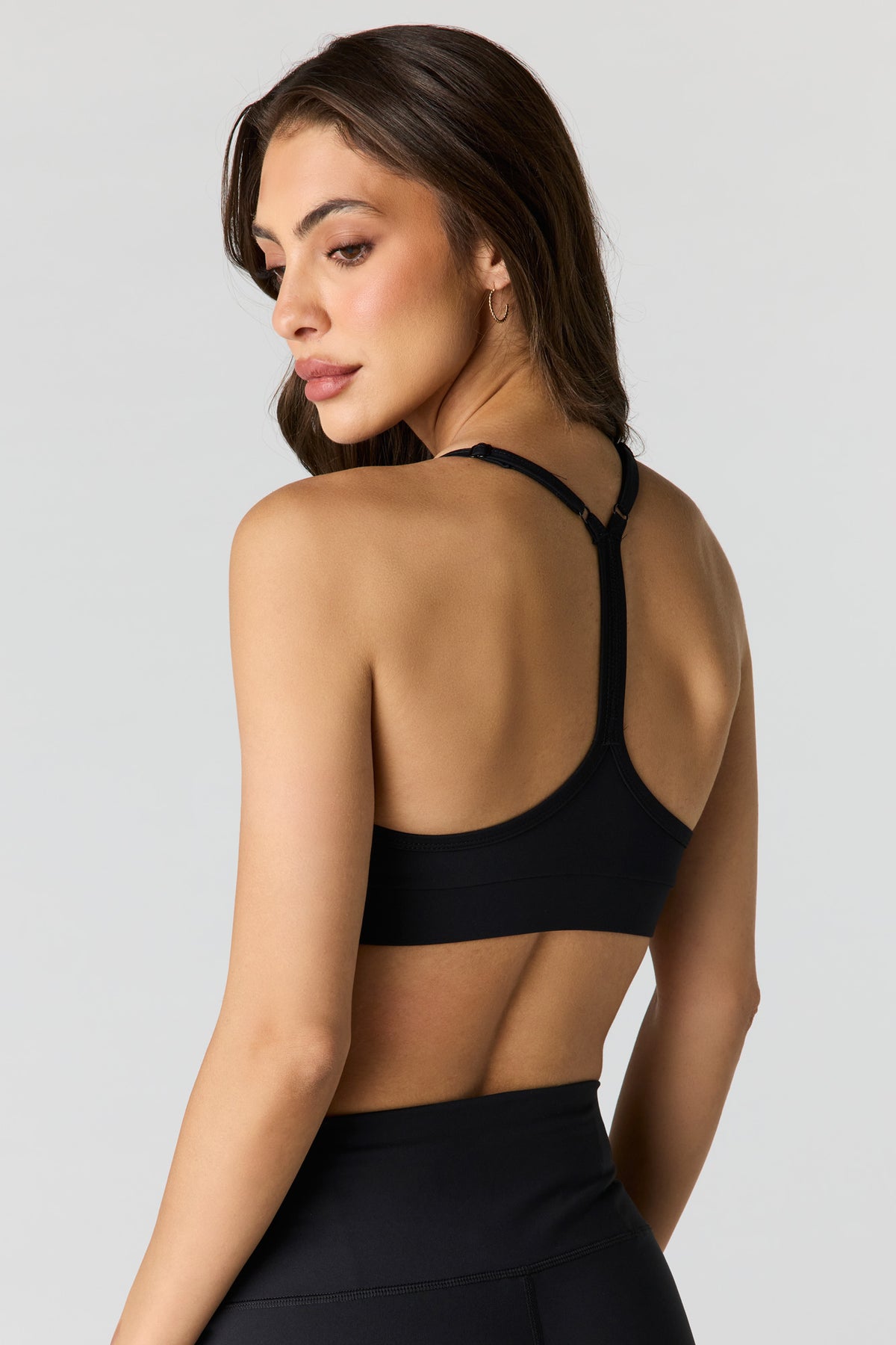 Alt View 2. U/A Racerback Sports Bra - Black