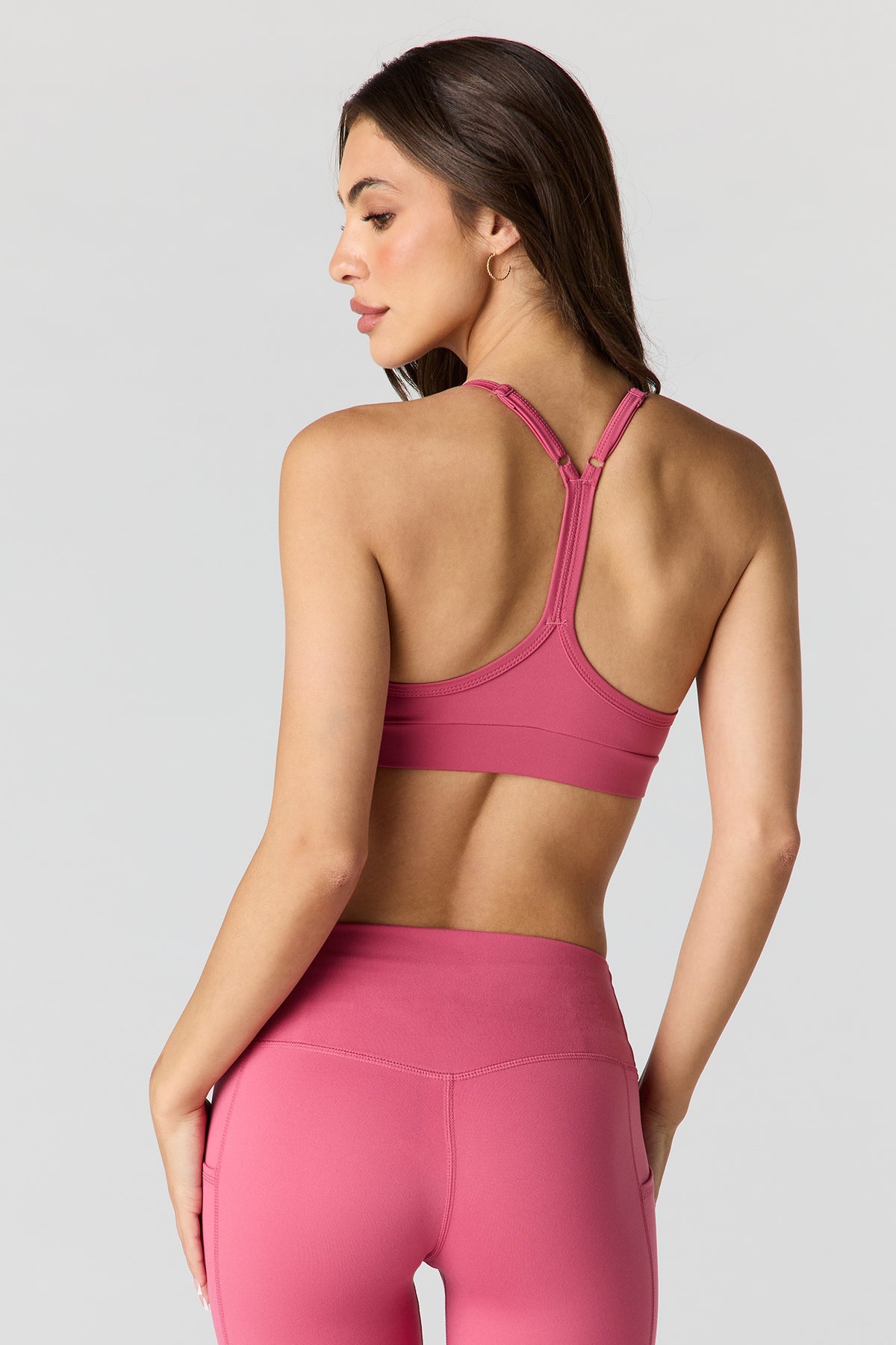 Alt View 2. U/A Racerback Sports Bra - Dark Pink
