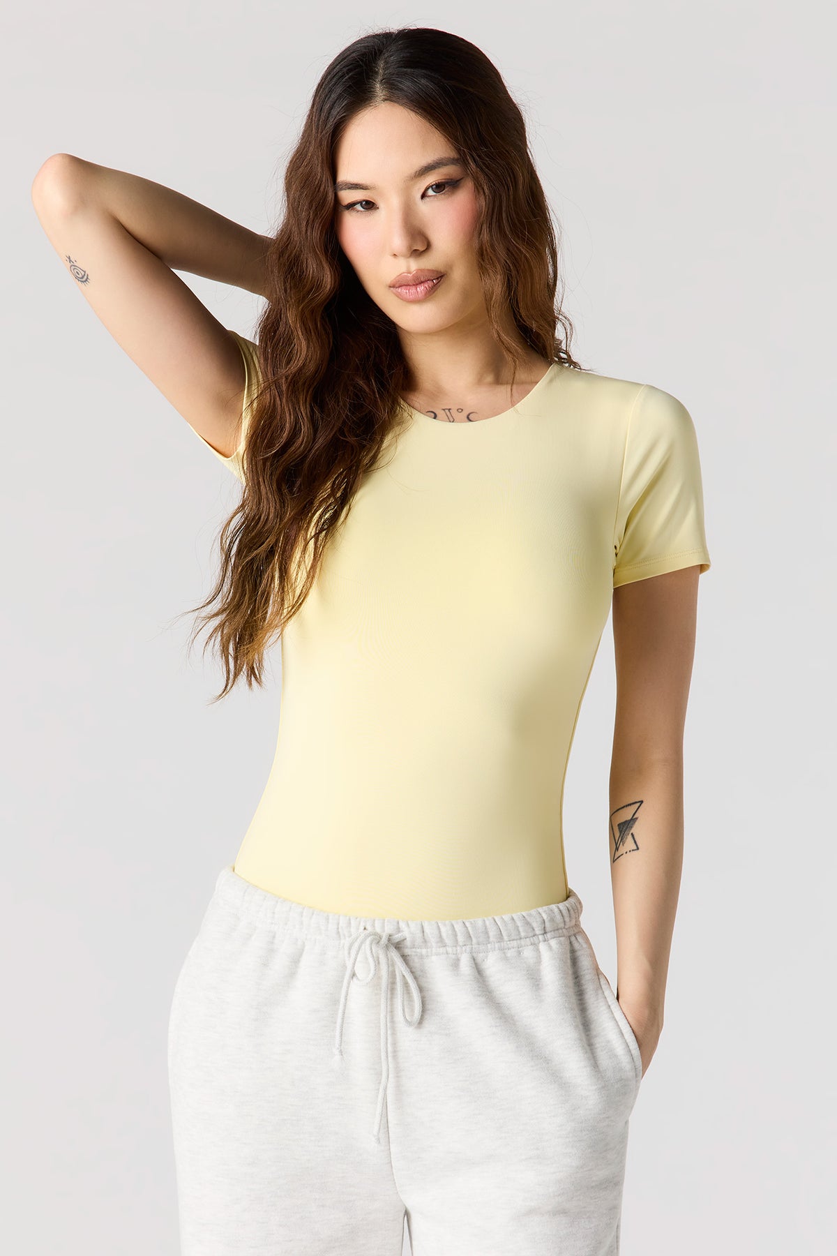 Maillot ras du cou profilé à manches courtes