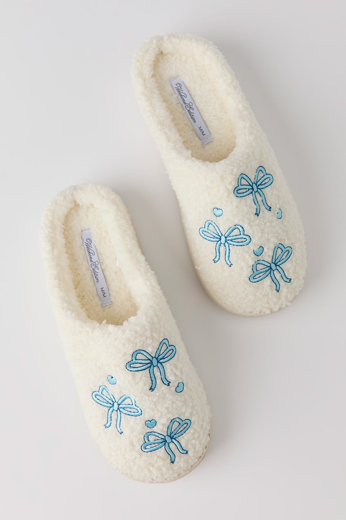 Vue alternative 2. Pantoufles en Sherpa avec boucles