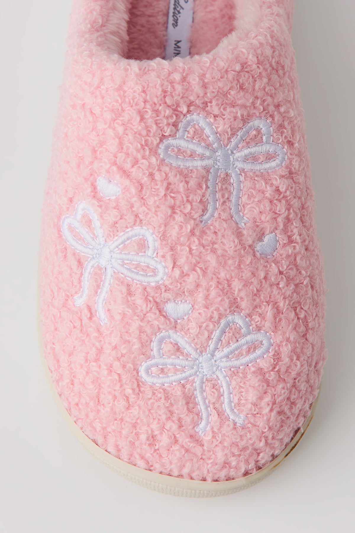Vue alternative 3. Pantoufles en Sherpa avec boucles